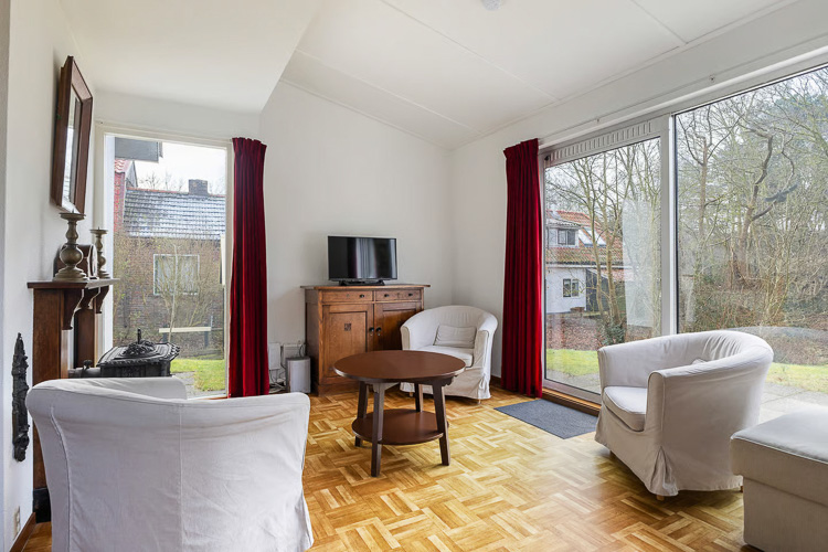 Idica vakantiehuis Schiermonnikoog woonkamer schuifpui