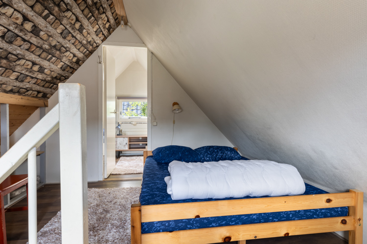 Vakantiehuis Schiermonnikoog Yn de Hamaye overloop[ slaapkamer