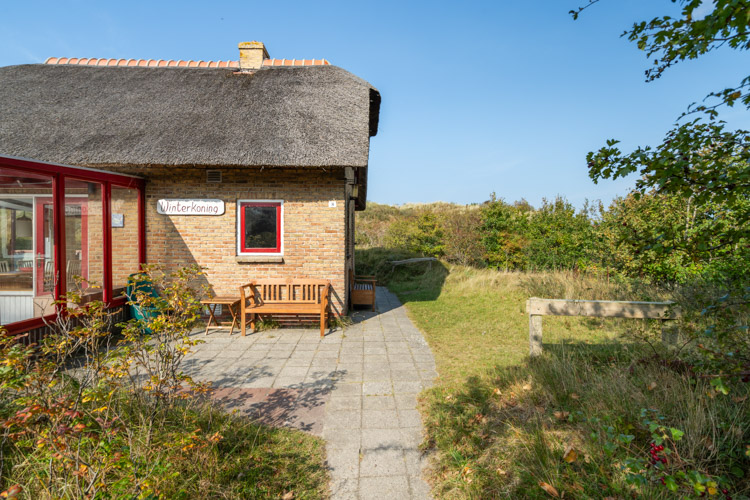 Ingang en vuurtoren Winterkoning vakantiehuis Schiermonnikoog