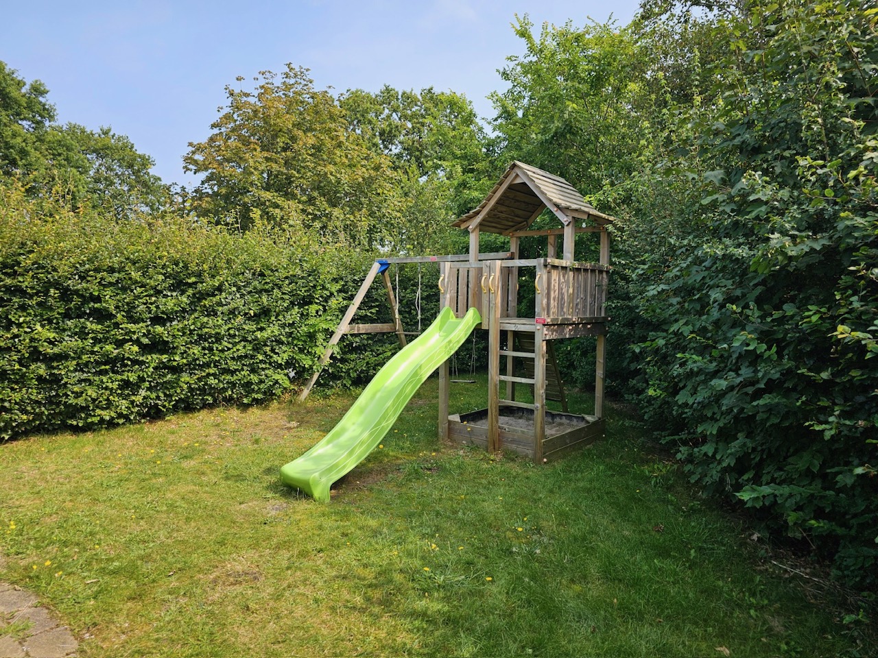 met kin dop vakantie kindvriendelijk tuin oase bungalow schiermonnikoog